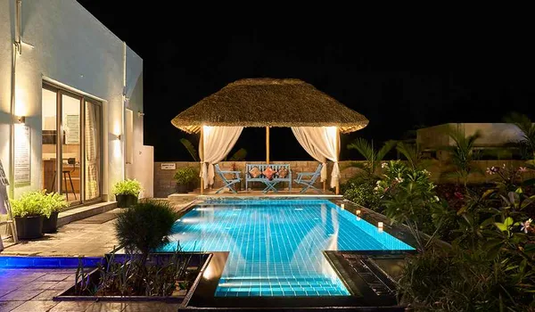 Nambiar Aranyaka Poolside Cabana Night View